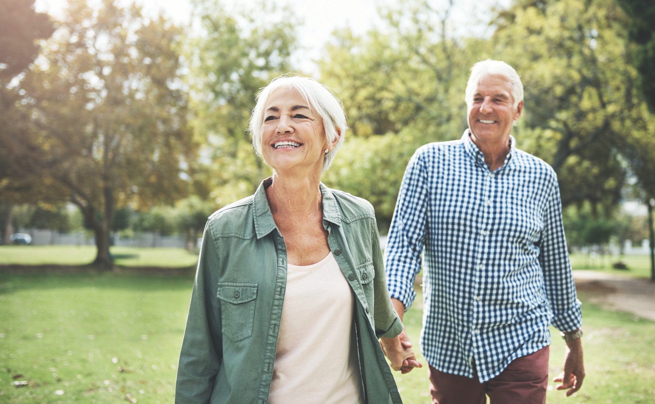 Older couple holding hands